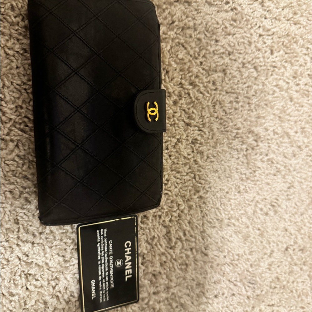 CHANEL Black Quilted Leather Wallet with Gold Logo